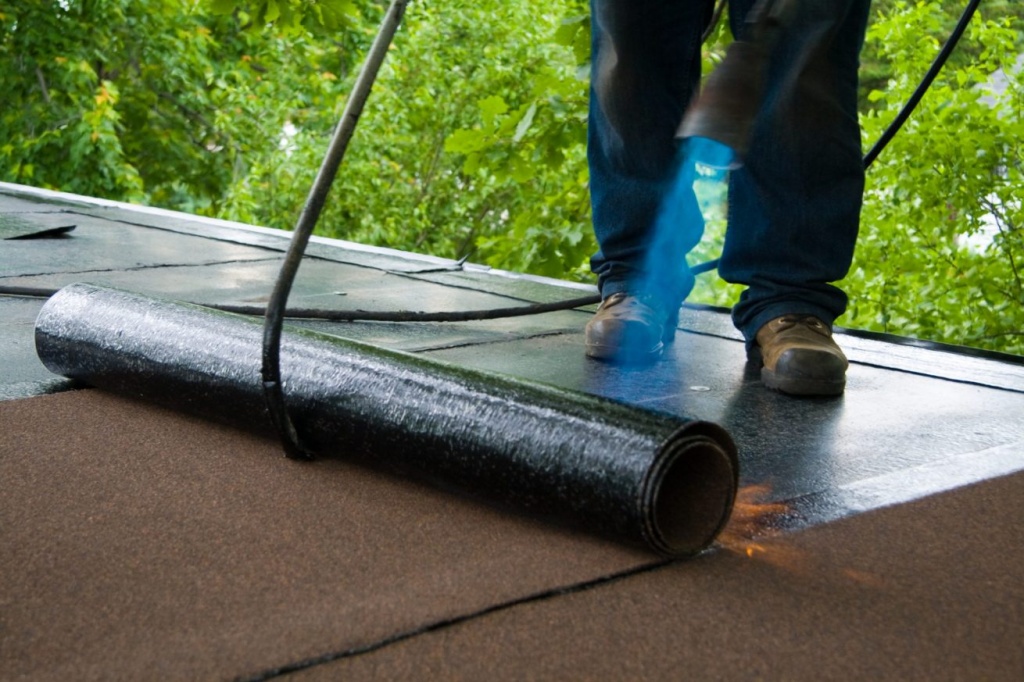modified bitumen vs roll roofing